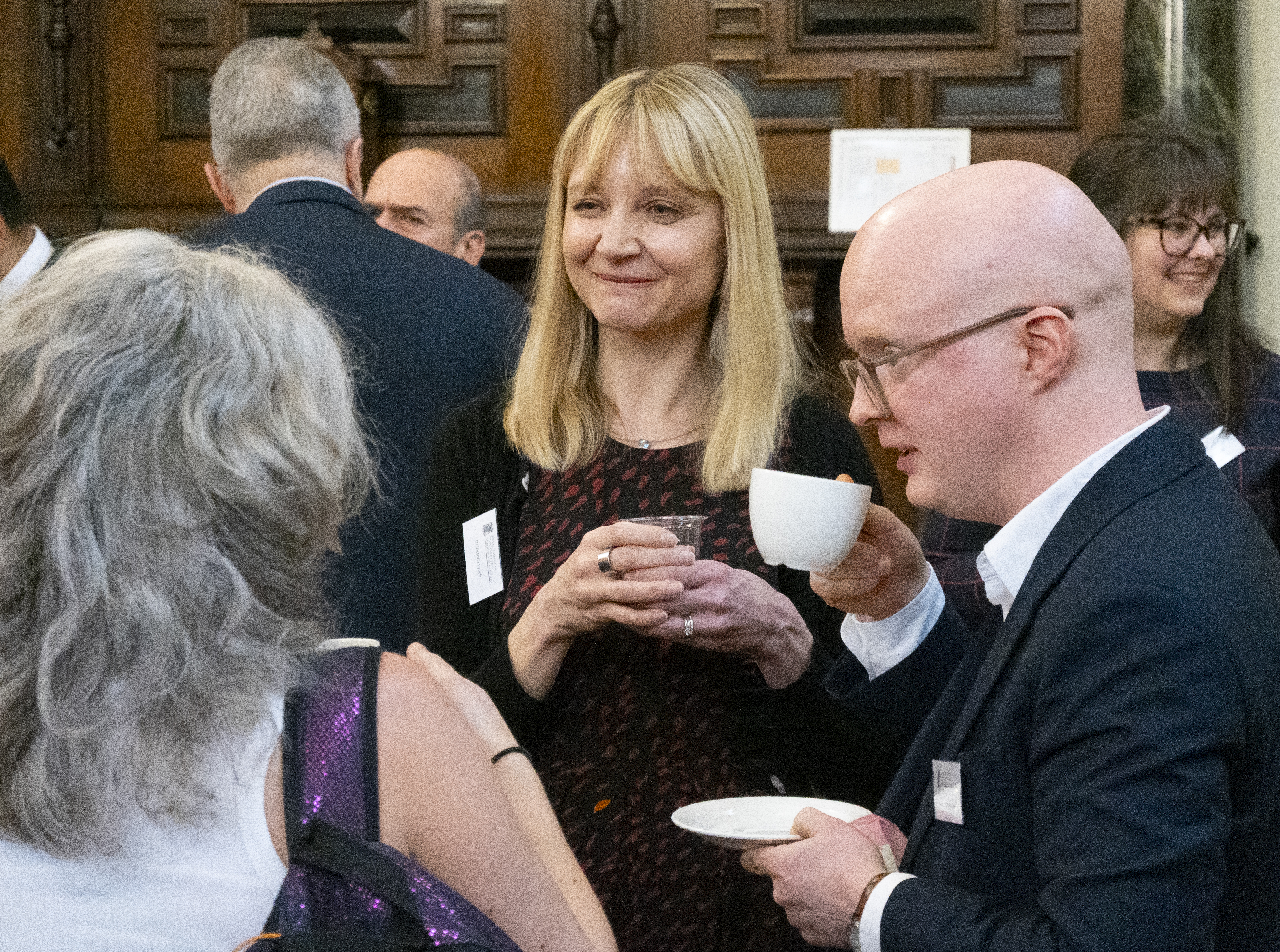 people chatting at the conference